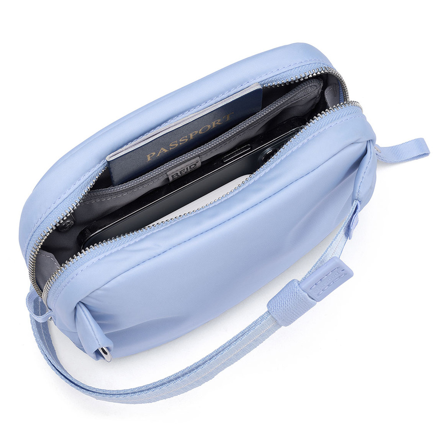 Torebka/biodrówka damska 2w1 antykradzieżowa Pacsafe W - błękitna