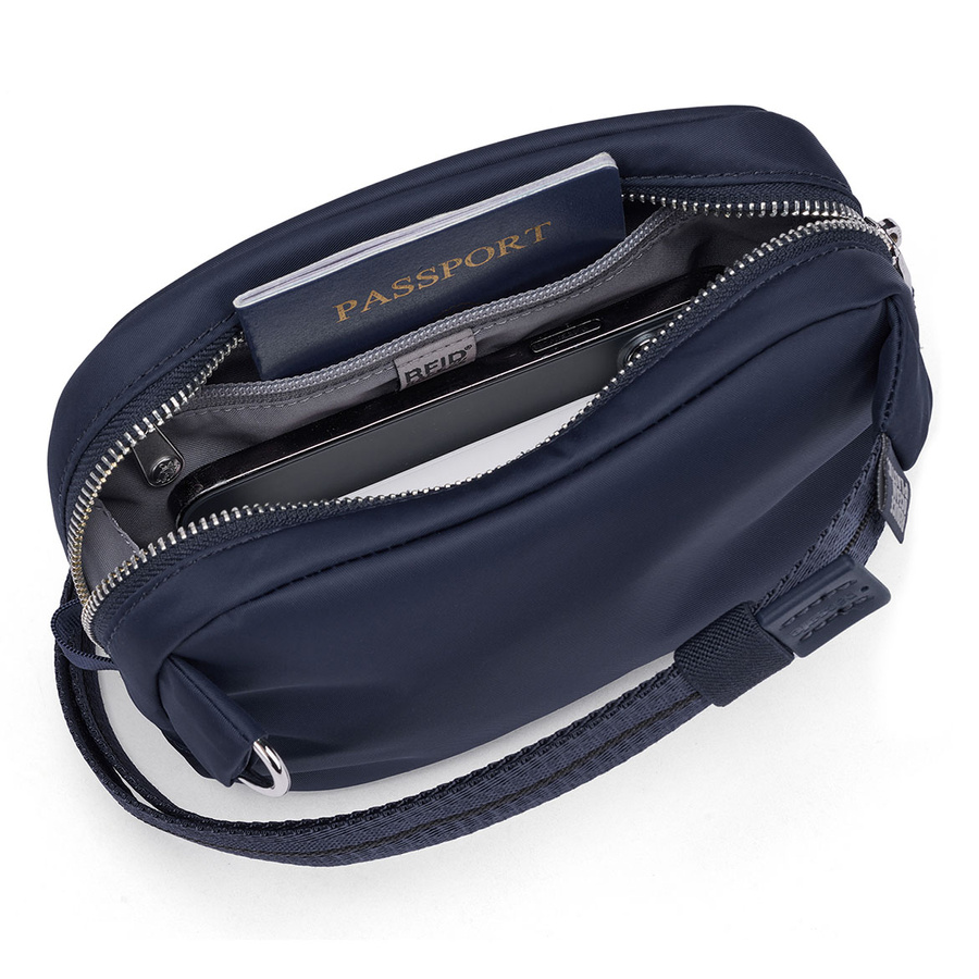 Torebka/biodrówka damska 2w1 antykradzieżowa Pacsafe W - granatowa