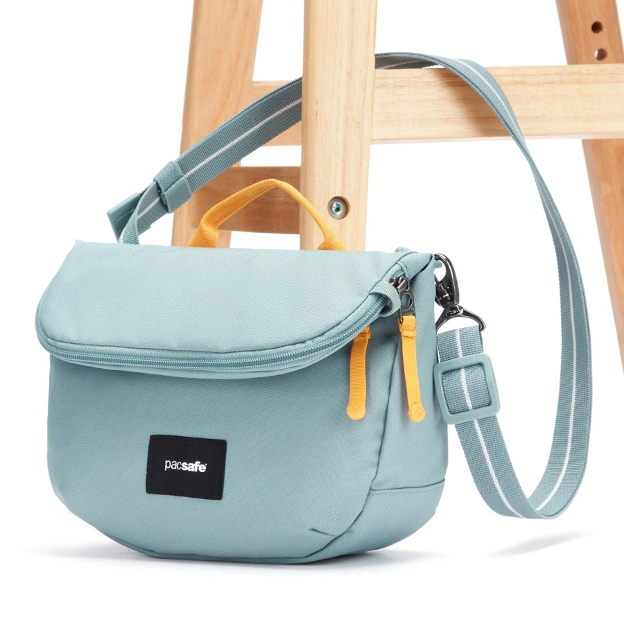 Folding anti-theft women's handbag Pacsafe Go - mint