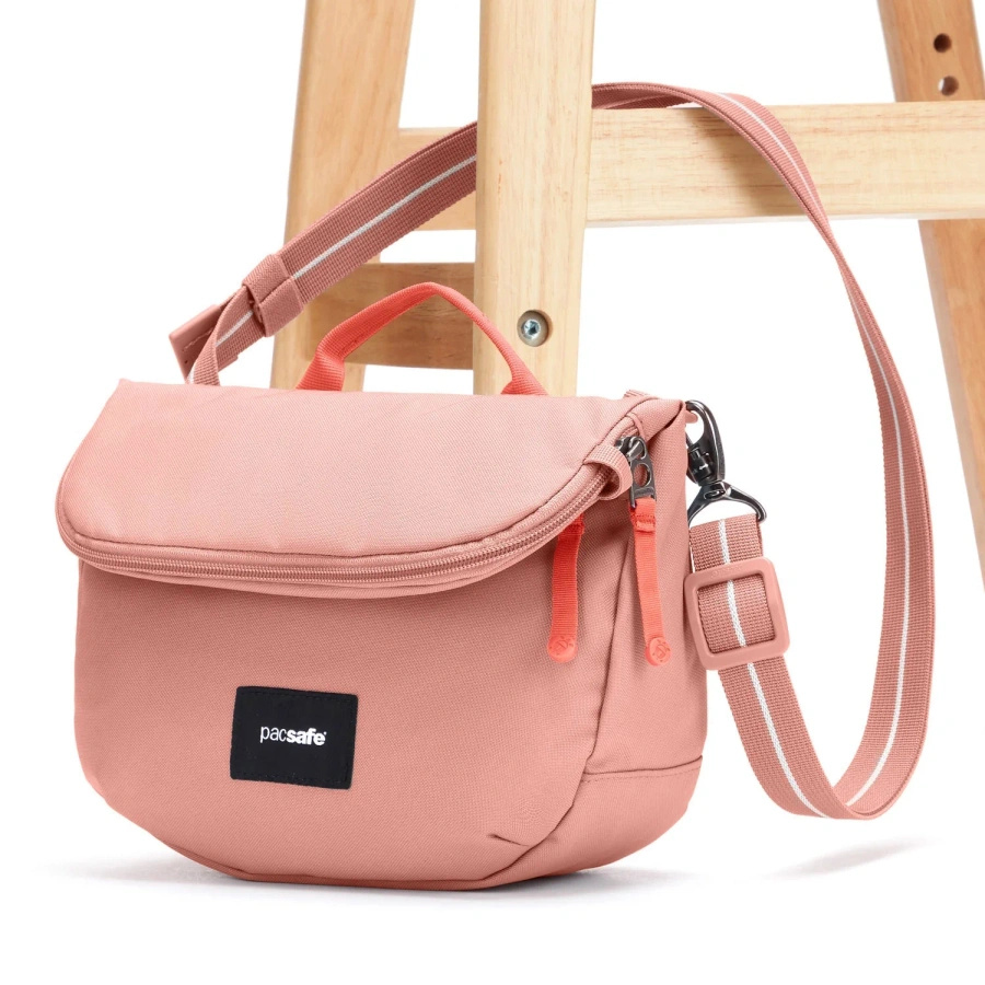 Folding women's anti-theft bag Pacsafe Go - pink