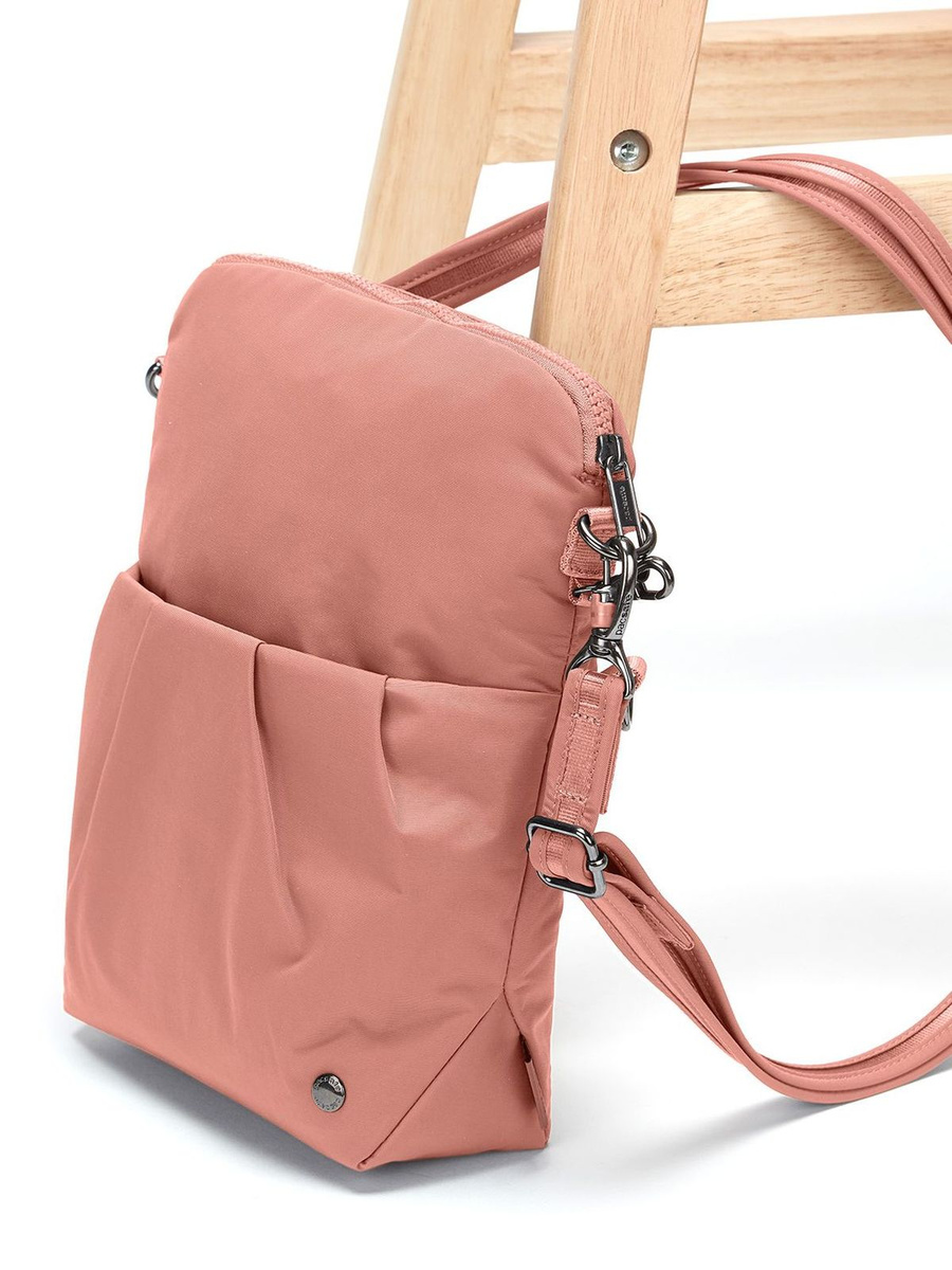 The foldable women's anti-theft handbag Pacsafe Citysafe CX Econyl® - pink