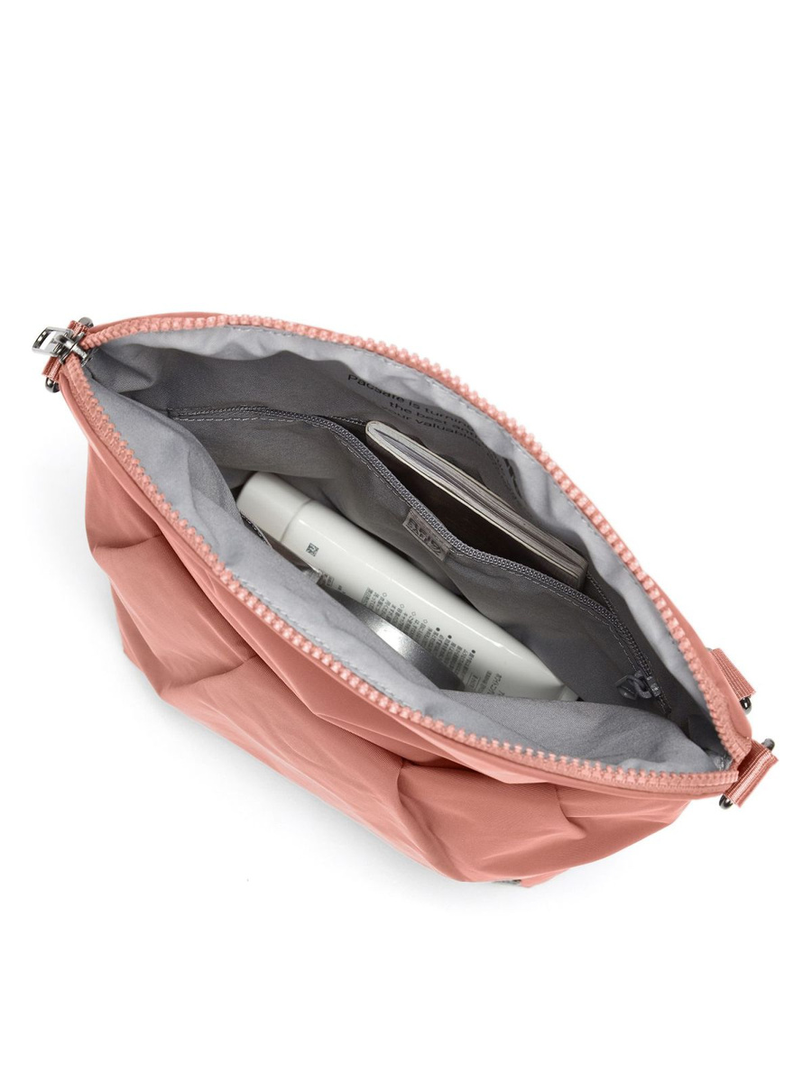 The foldable women's anti-theft handbag Pacsafe Citysafe CX Econyl® - pink